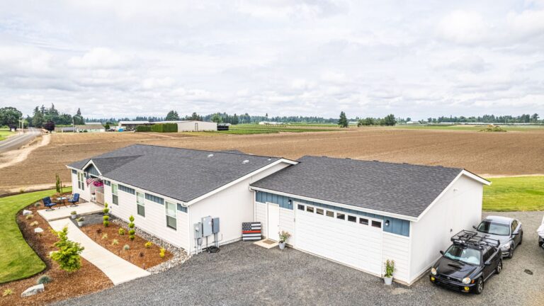 Exterior of a modern manufactured home on agricultural land